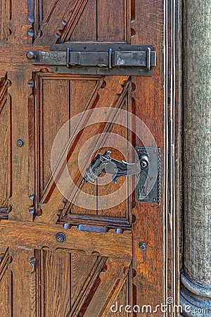 An old wooden door with an antique locks Stock Photo