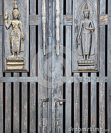 Old wooden door in the church Stock Photo