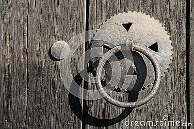 Old wooden door with hinge and lock Stock Photo
