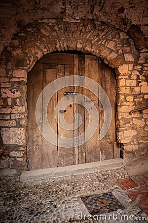 Old wooden door of the middle evo Stock Photo