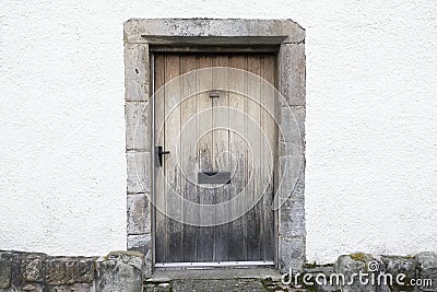 Old wooden door rustic ancient house entrance in Culross Stock Photo