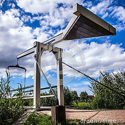 Old wooden Dutch bridge in park Stock Photo