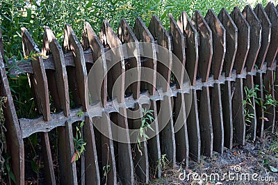 Old wooden fence in the village Stock Photo