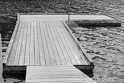 Old wooden floating dock Stock Photo