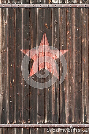 Old wooden gate with soviet star Stock Photo