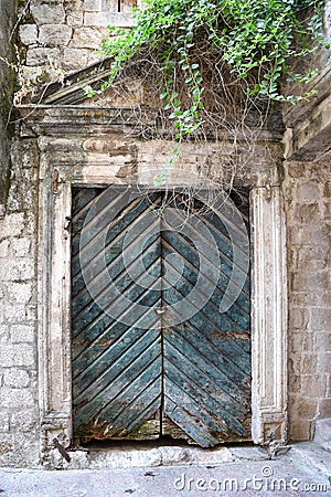 Old wooden green doors in Montenegro in Kotor Stock Photo