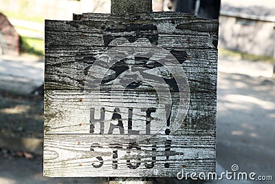 Old wooden halt sign, Auschwitz Editorial Stock Photo