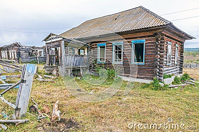 An old wooden house is crumbling Stock Photo