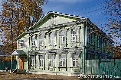 Old wooden house end of the 19th century with traditional carved window frames and details in the historical center of Tver city Editorial Stock Photo