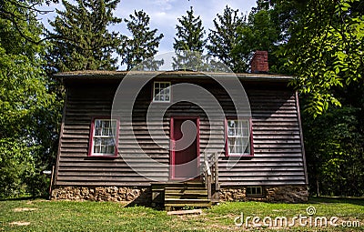 Old wooden house. Historical home. Cabin in forest Stock Photo