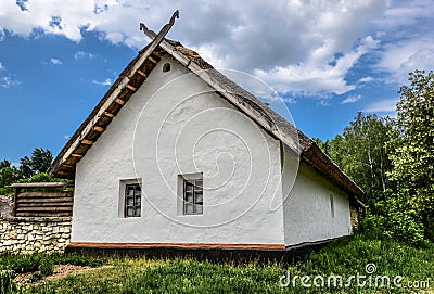 An old wooden houses of Woodland in National museum of Ukrainian Folk Architecture. The architecture of traditional Carpathian Editorial Stock Photo