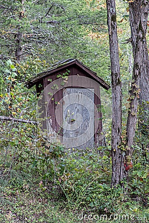 Old wooden outhouse Stock Photo