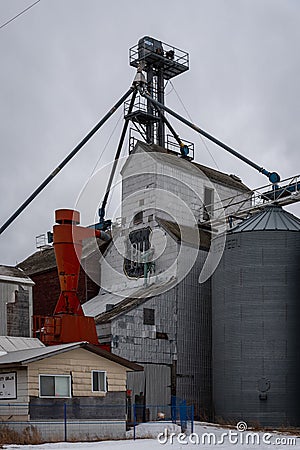 Old wooden grain elevator in the town of Three Hills Editorial Stock Photo