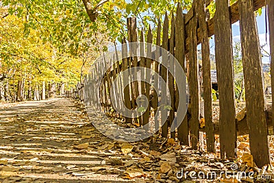 Old Wooden Picket Fence on a Historic Farm Stock Photo