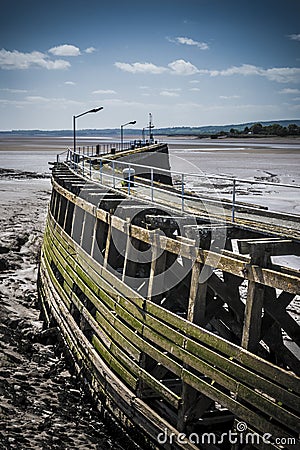 Old wooden pier at Sharpness Stock Photo