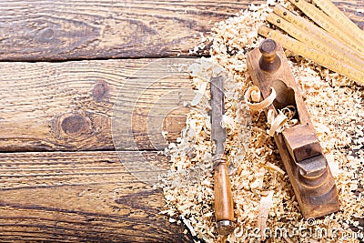 Old wooden planer with sawdust Stock Photo