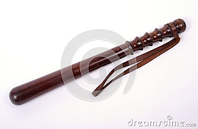 Old wooden police truncheon. Stock Photo