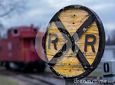 Old wooden railroad RR sign with caboose Stock Photo