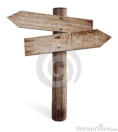 Old wooden road sign with left and right arrows Stock Photo