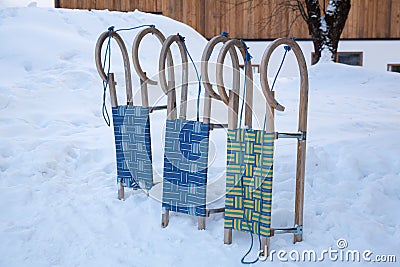 Wooden sledges on snow in winter time Stock Photo