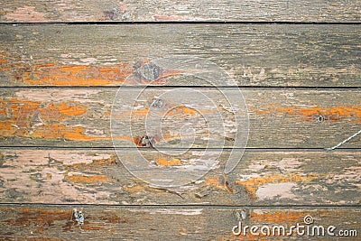 Old wooden surface with peeling varnish and peeling paint. Stock Photo