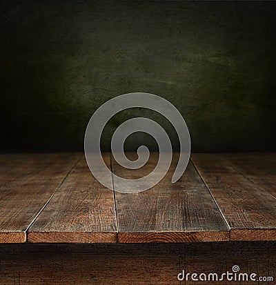 Old wooden table with dark background Stock Photo