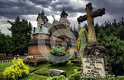 Old wooden Vang stave church in summer. Karkonosze mountains, Karpacz, Poland Editorial Stock Photo