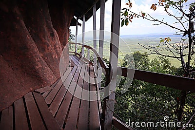 Old wooden walkway on a steep cliff, Thailand tourism concept Stock Photo