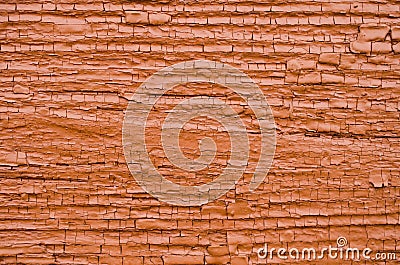 Old wooden wall with cracked dark orange paint Stock Photo