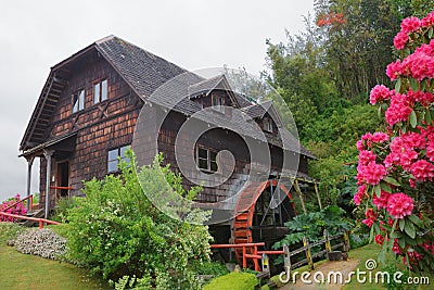 Old wooden water mill in Frutillar village, german colonial muse Stock Photo