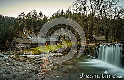 Old wooden water mill at National Nature Reserve Kvacianska dolina, Slovakia Stock Photo