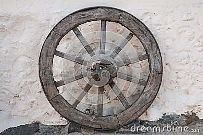 Old wooden wheel - antique horse carriage wheel Stock Photo