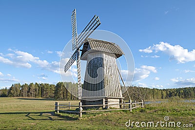 Old wooden windmill close-up. Mikhailovskoye Stock Photo