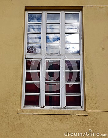 Old wooden window on old Russian-comunist type style building Stock Photo