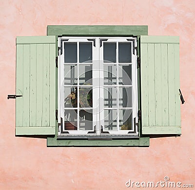 Old wooden window with opened shutter blinds Stock Photo