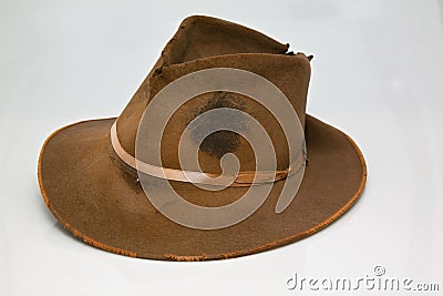 Old, worn brown hat Stock Photo