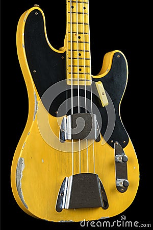 Old, worn electric bass guitar in 1950s style - musical instrument Stock Photo