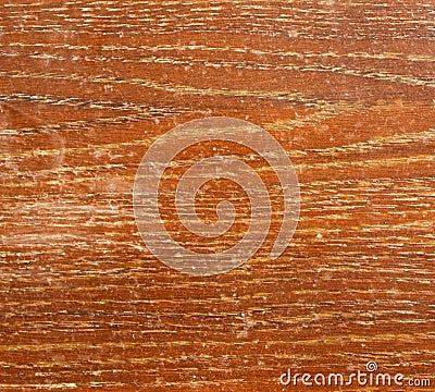 Old worn orange wooden surface with peeling varnish Stock Photo