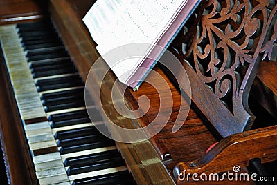 Old worn out piano close up of missing keys Stock Photo