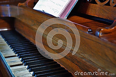 Old worn out piano close up of missing keys Stock Photo