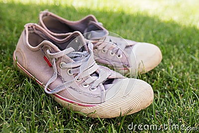 Old worn sneakers Stock Photo