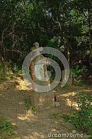 Old worn Stone gravetombs on a cemetery in the Romanian countryside Editorial Stock Photo