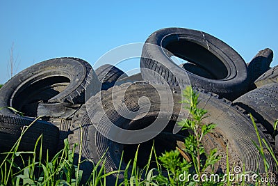 Old, worn, used black tires. Stock Photo