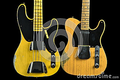 Old and worn vintage electric guitar and bass in 1950s style - musical instrument Stock Photo