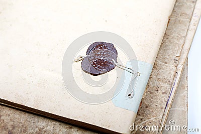 Old writing-book with the sealing wax Stock Photo