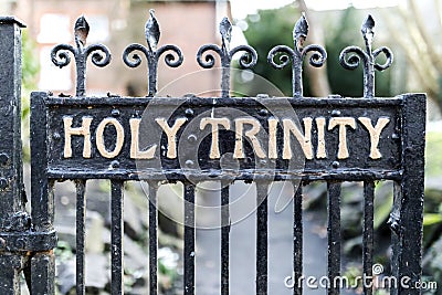 Old wrought iron Holy Trinity Rectory Gates with peeling paint a Stock Photo