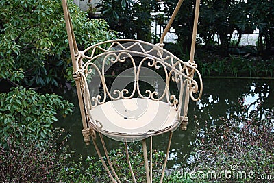 old wrought-iron swing Stock Photo