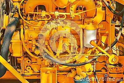 Old yellow diesel engine details Stock Photo