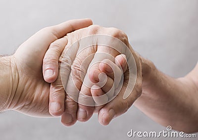 Old and young hand Stock Photo