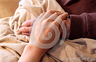 Old and Young Hands Stock Photo